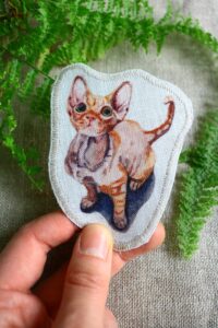 Dzikie Twory - lniana naszywka z akwarelowym nadrukiem - łysy kot