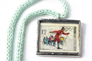 Dzikie Twory - naszyjnik ze znaczkiem pocztowym z 1968 roku - Igrzyska Olimpijskie 