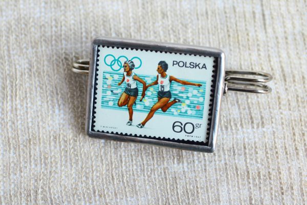 Dzikie Twory - naszyjnik ze znaczkiem pocztowym z 1967 roku, Apel olimpijski