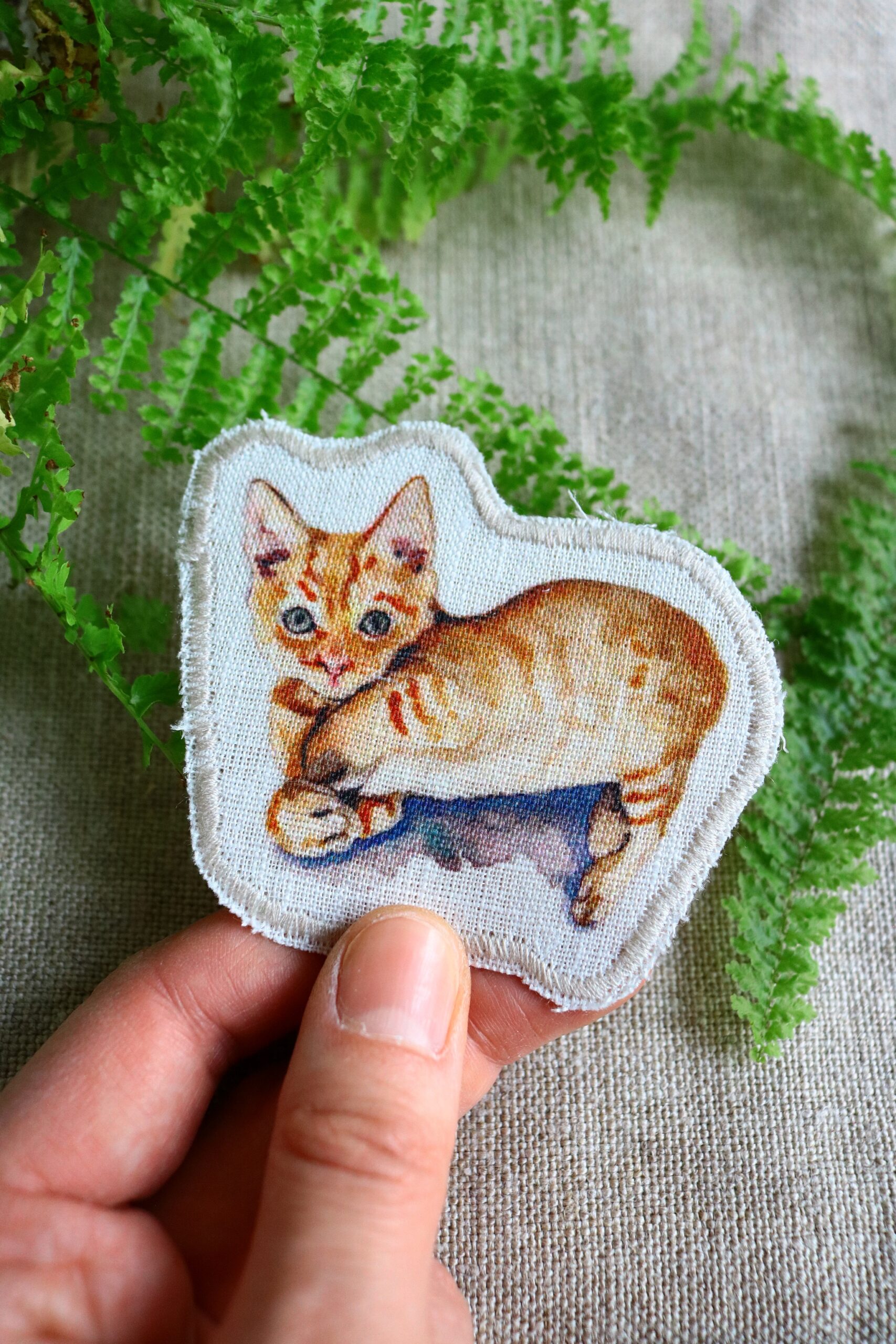 Dzikie Twory - lniana naszywka z akwarelowym nadrukiem - mały rudy kotek