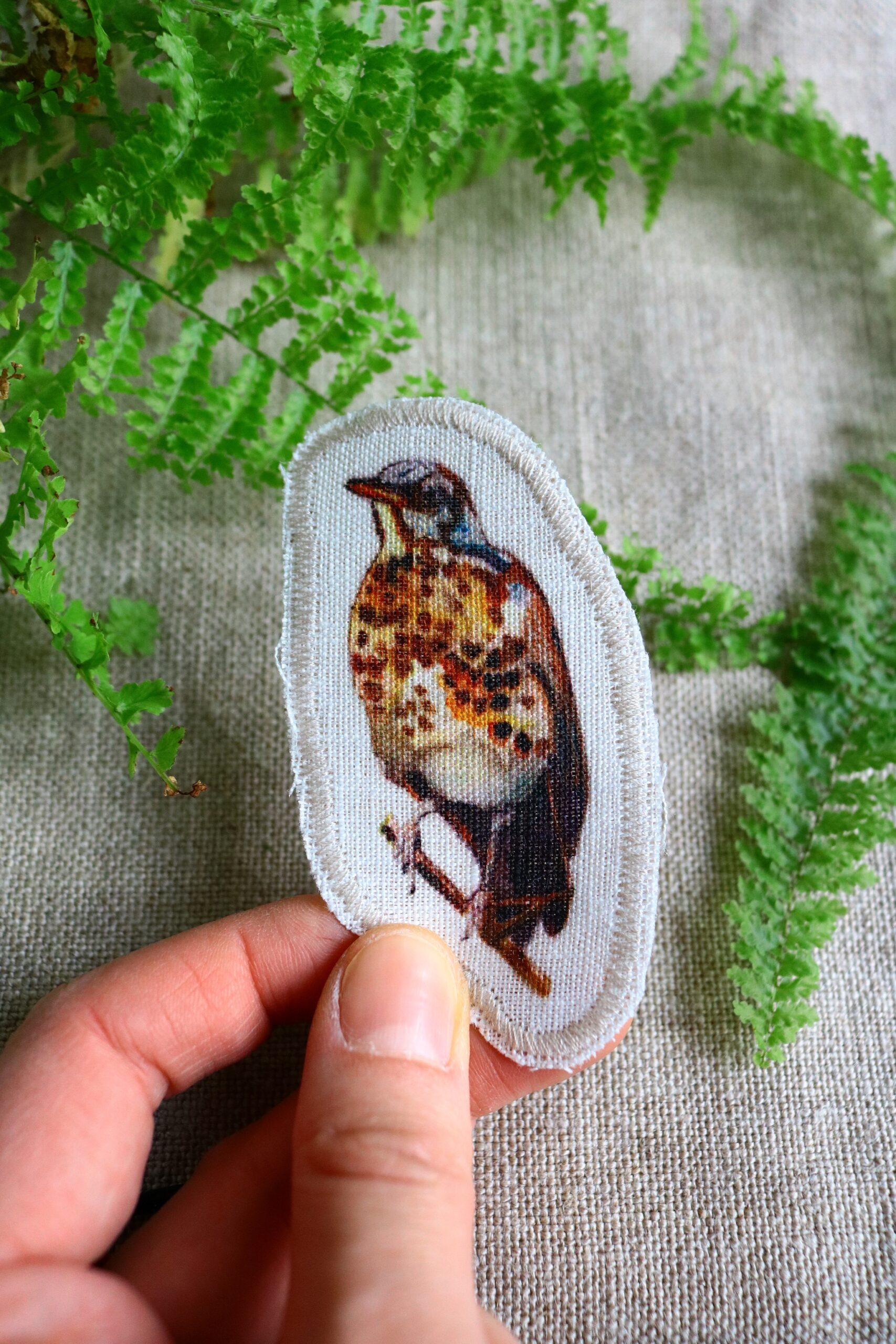 Dzikie Twory - lniana naszywka z akwarelowym nadrukiem - ptak kwiczoł