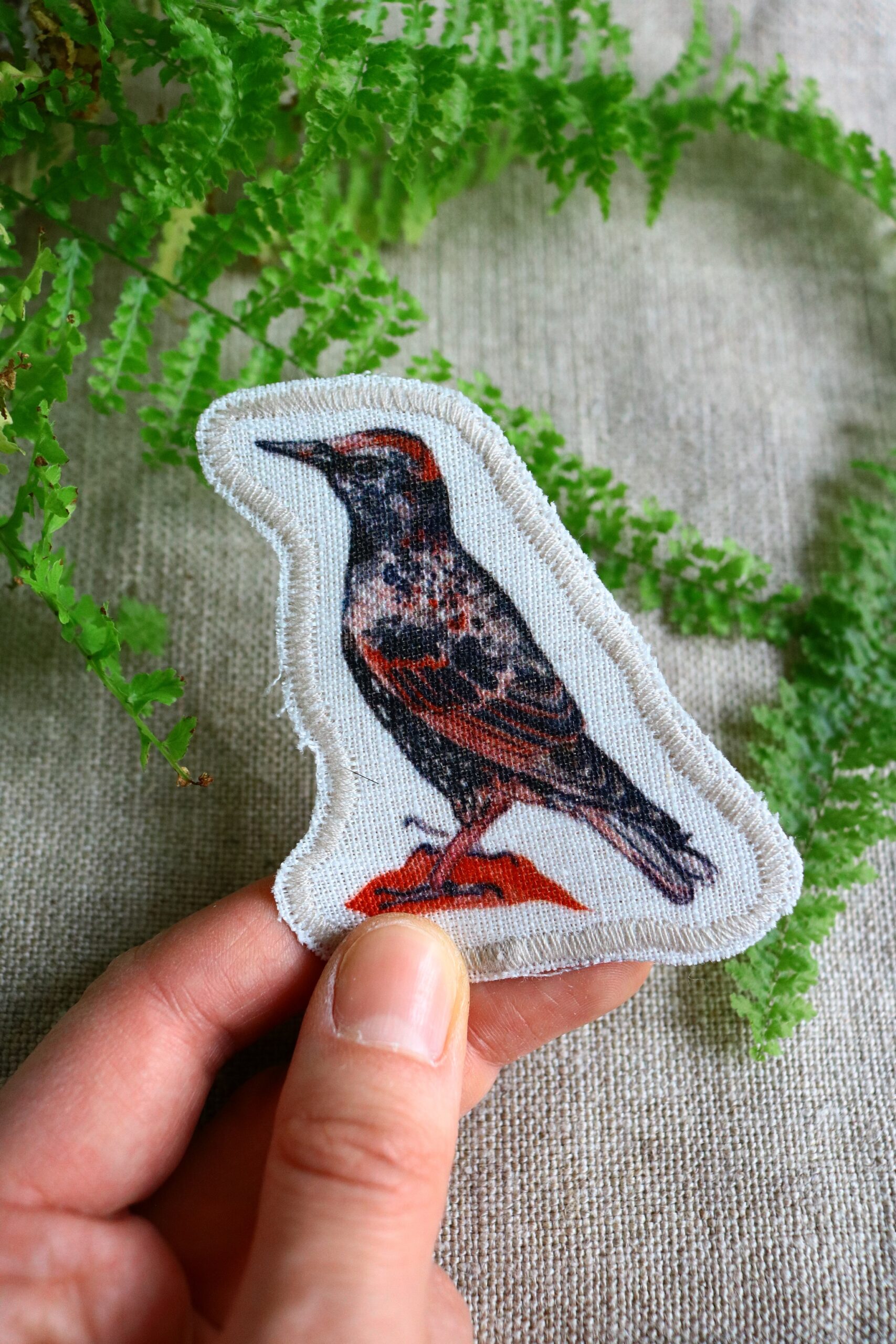 Dzikie Twory - lniana naszywka z akwarelowym nadrukiem - szpak